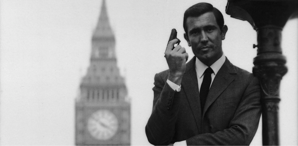 Promotional Image for On Her Majesty’s Secret Service of Lazenby with a Walther PPK