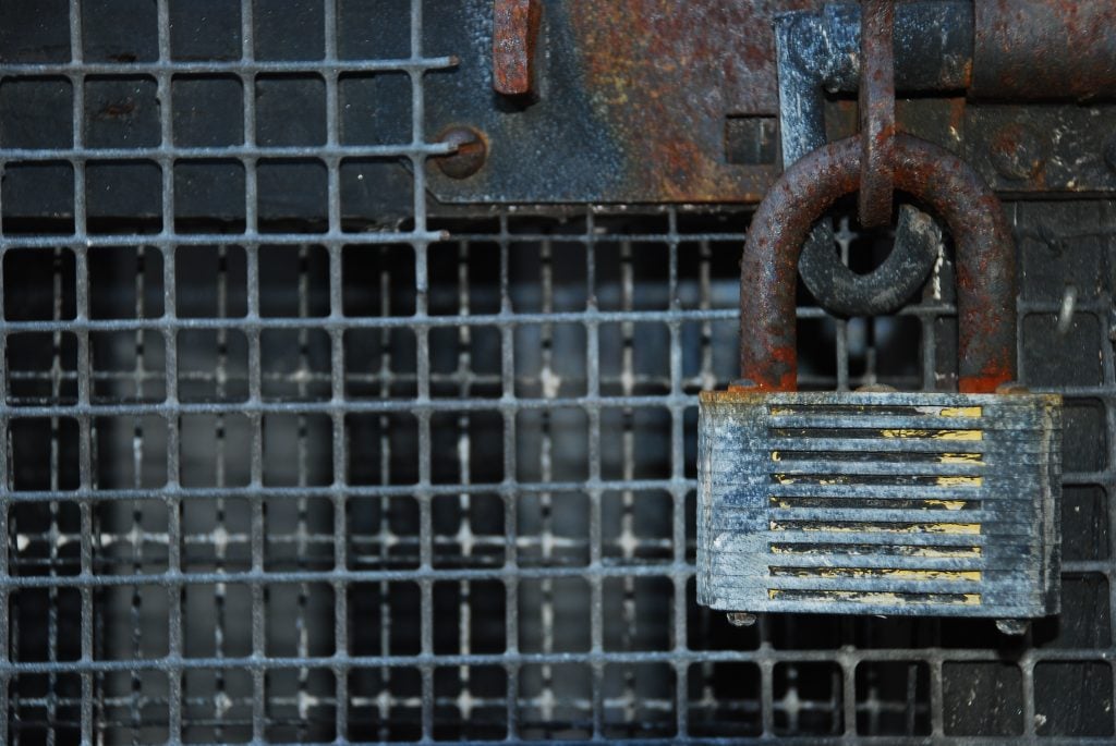 rusty laminated padlock