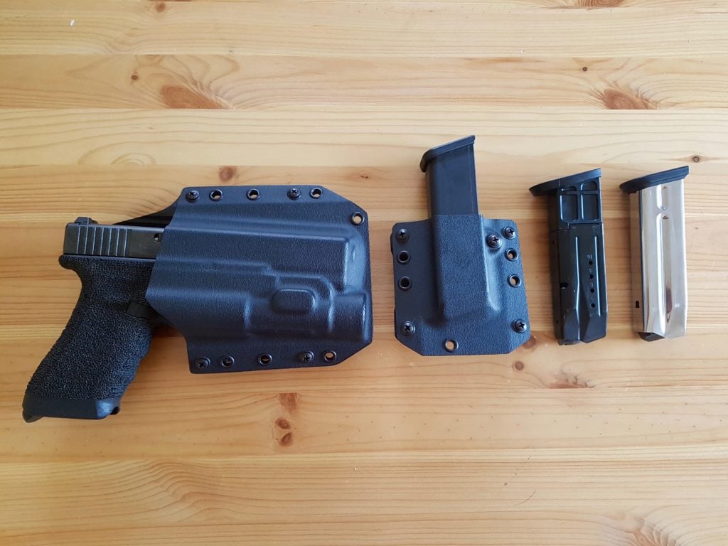 Bravo Concealment, Glock 17 with TLR-1 and Mag Pouch